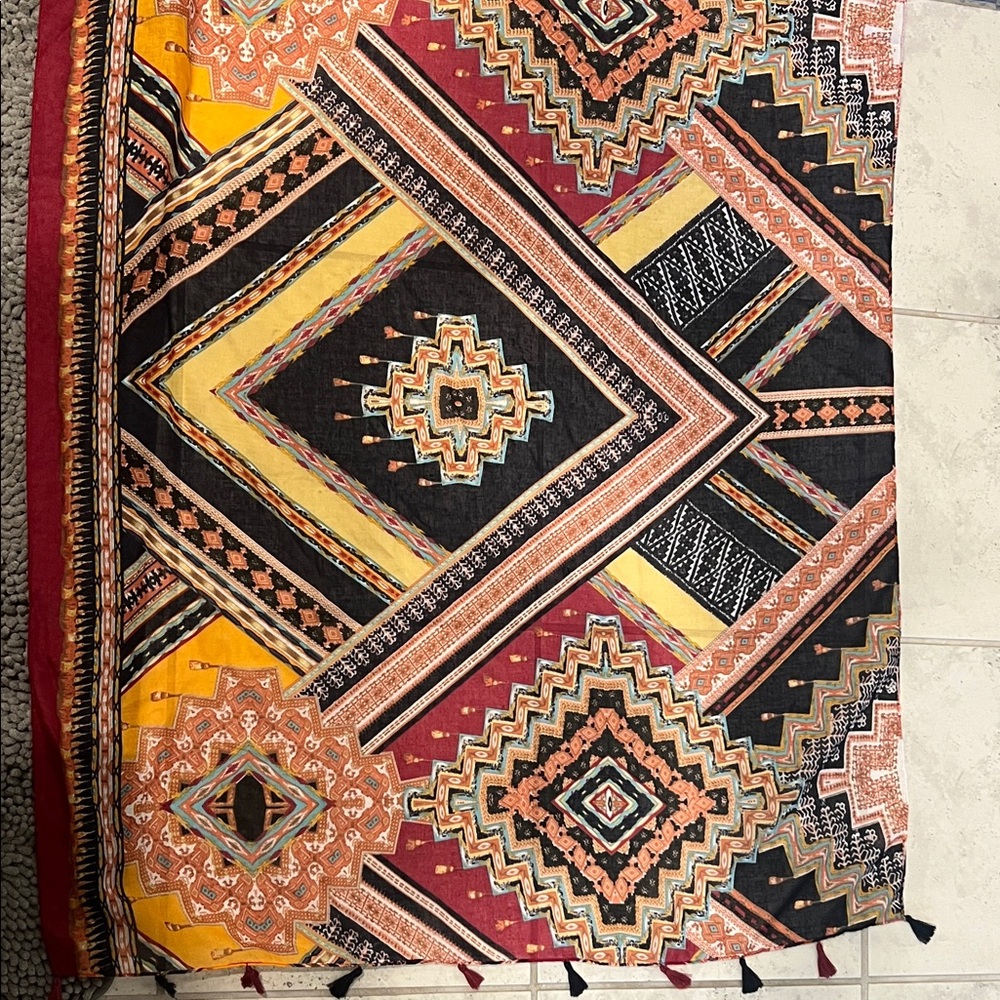 Geometric Patterned Textile Scarf in Red, Yellow, and Black